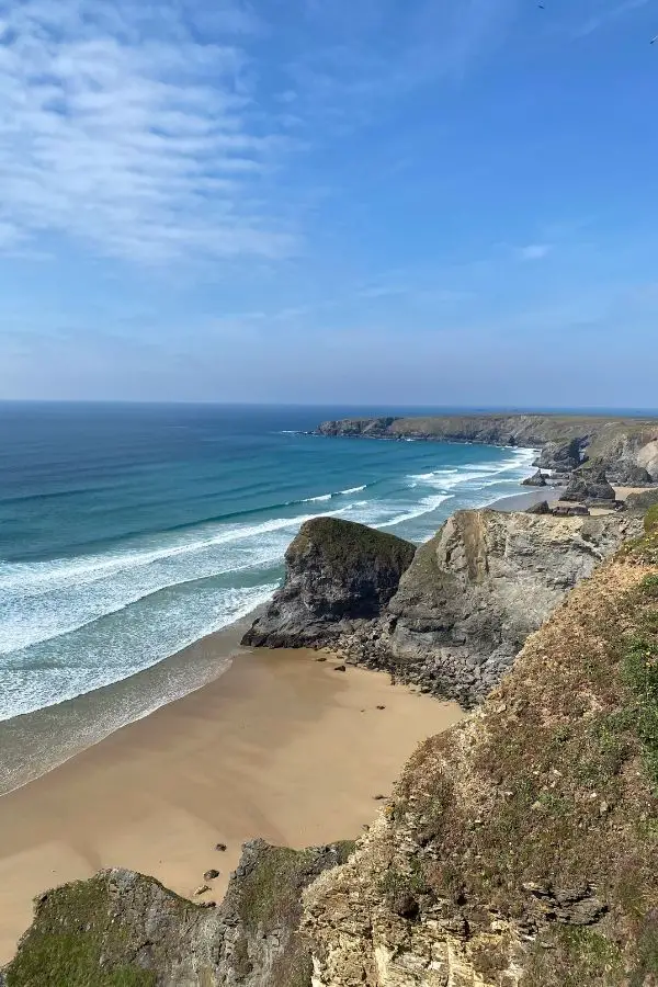 Bedruthan Steps coastline with tide out
