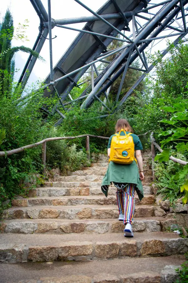 Girl walking up stairs inside the Eden Project